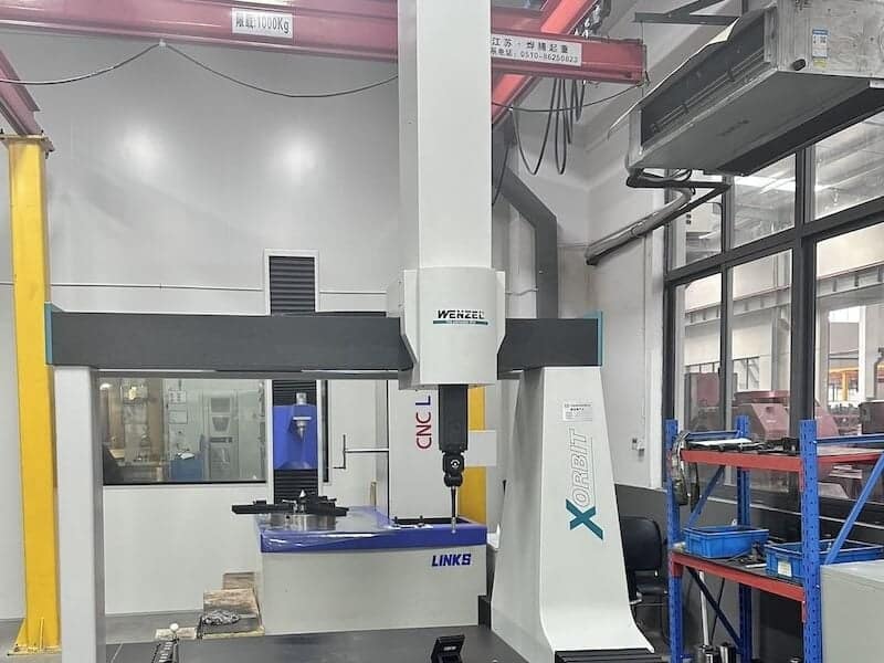 German-engineered WENZEL three-coordinate measuring machine (CMM) in Industrial Gearbox Quality Control,performing 4-axis gear metrology with tactile/optical sensors to ensure ISO 9001 compliance for helical, bevel, and worm gears